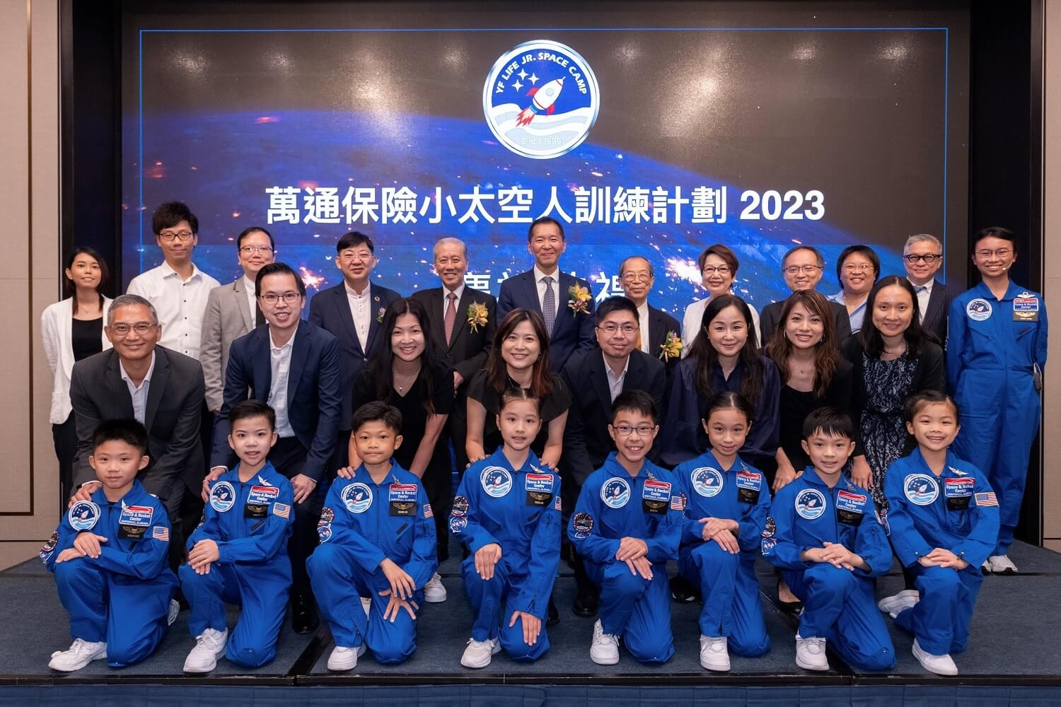 Mr. Victor Yip (third row, centre), CEO of YF Life, program patrons, school representatives, the eight Jr. Astronauts and their parents attended the Celebration Ceremony.